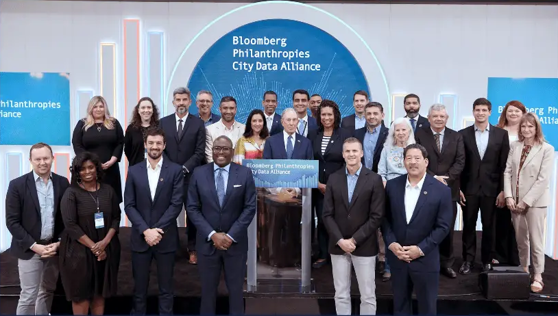 Mayors pose for a group photo during the 2023 Bloomberg Philanthropies City Data Alliance Mayoral Convening.